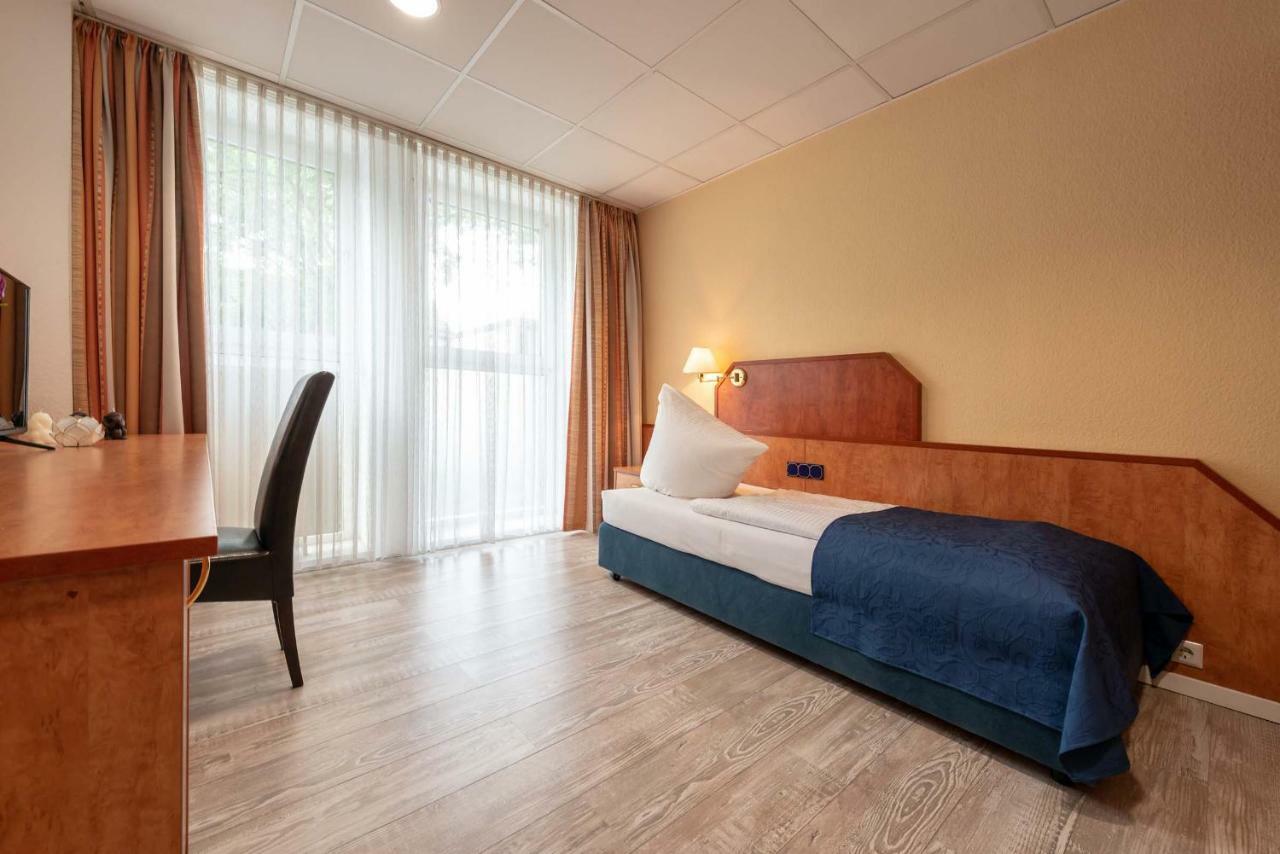 Hotel Boardinghouse Burgpark à Hürth Extérieur photo