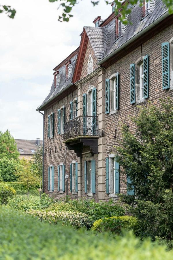 Hotel Boardinghouse Burgpark à Hürth Extérieur photo